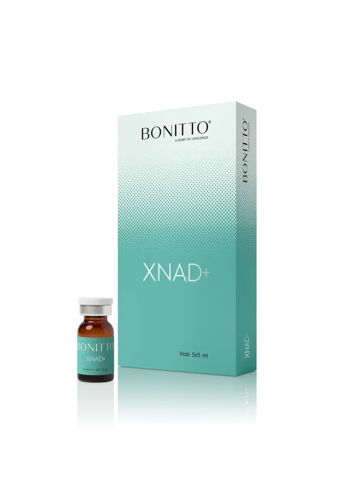 XNAD+ Une boîte sarcelle et blanche étiquetée "BONITTO XNAD+" se tient debout avec une petite fiole étiquetée "BONITTO XNAD+" devant elle. L'emballage est élégant et moderne, avec un design dégradé et un texte clair.